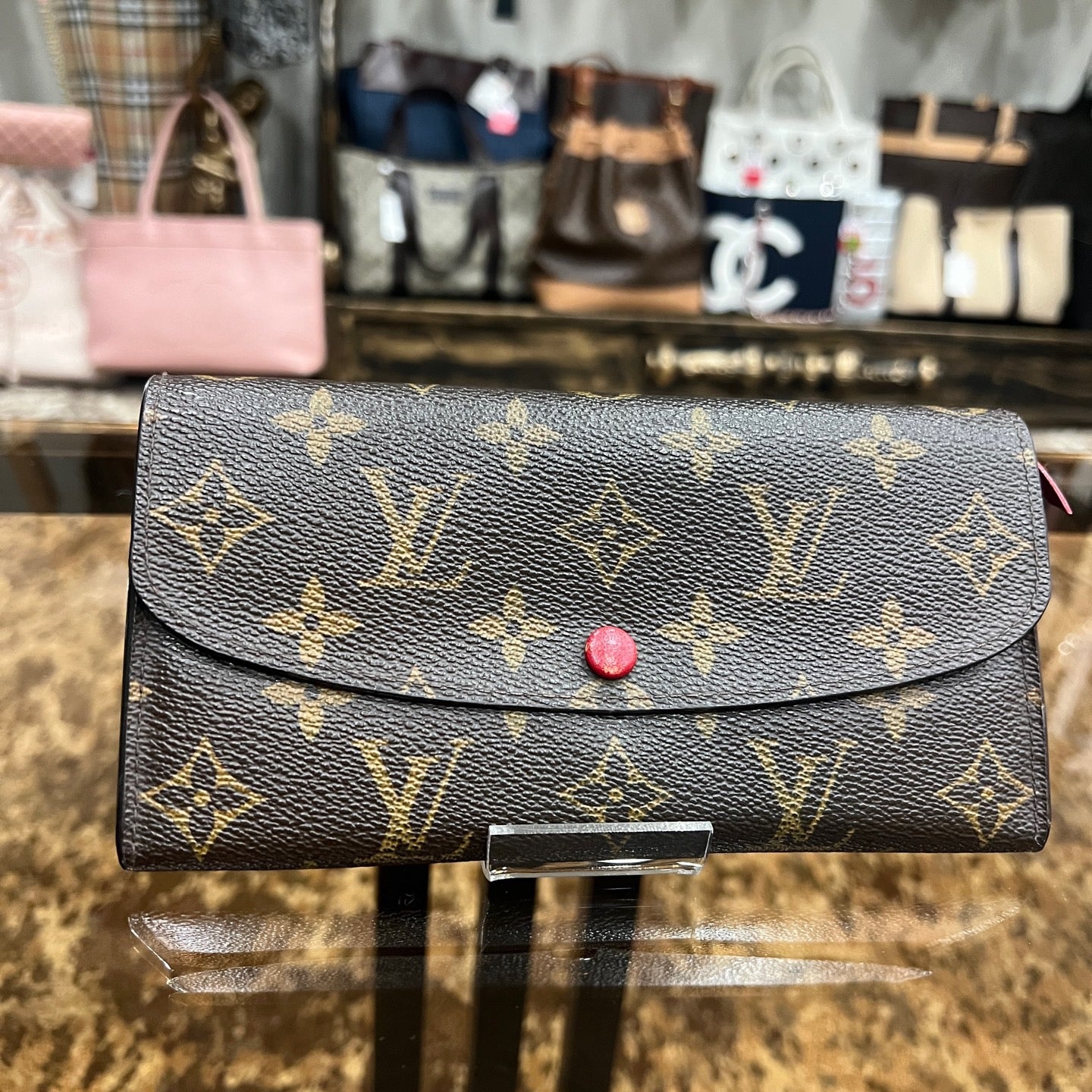 LOUIS VUITTON Monogram Brown Emilie Wallet with Red Button
