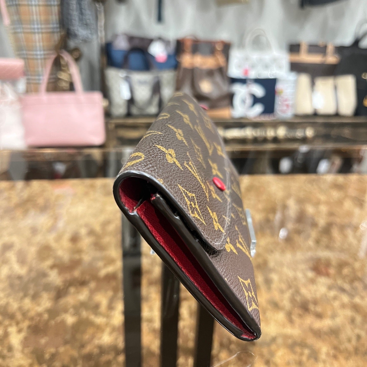 LOUIS VUITTON Monogram Brown Emilie Wallet with Red Button