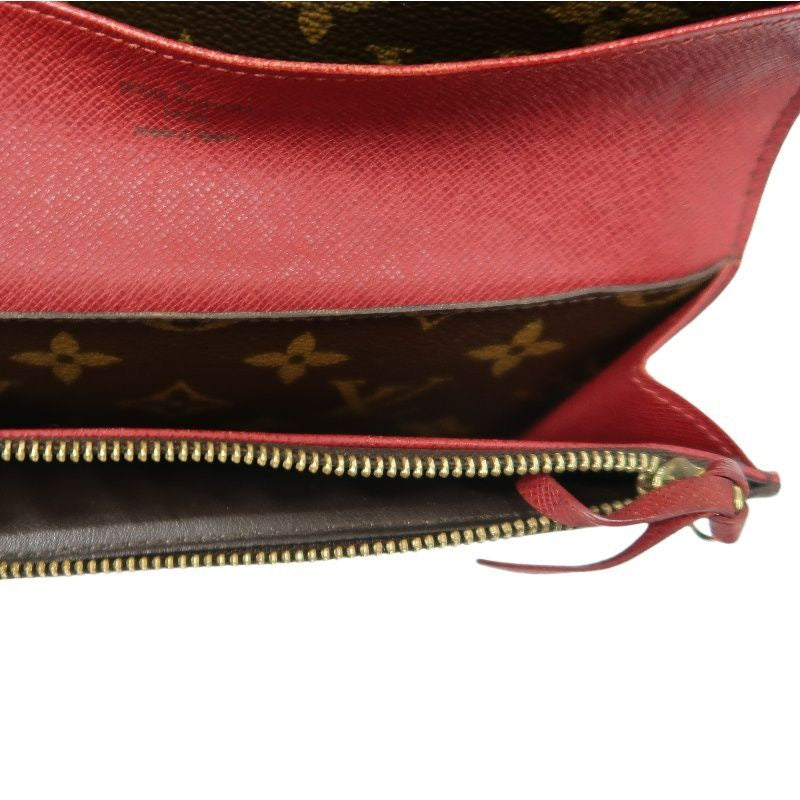 LOUIS VUITTON Monogram Brown Emilie Wallet with Red Button