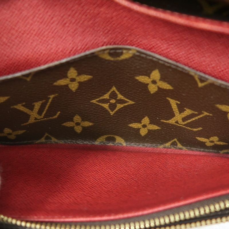 LOUIS VUITTON Monogram Brown Emilie Wallet with Red Button