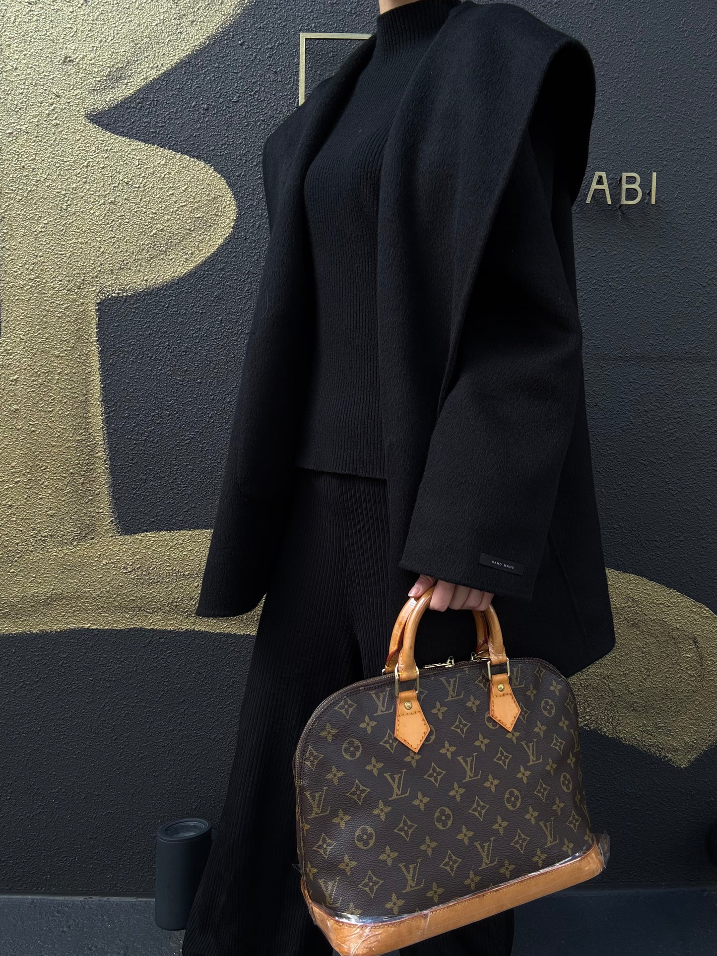 LOUIS VUITTON Alma Monogram Canvas Handbag Brow