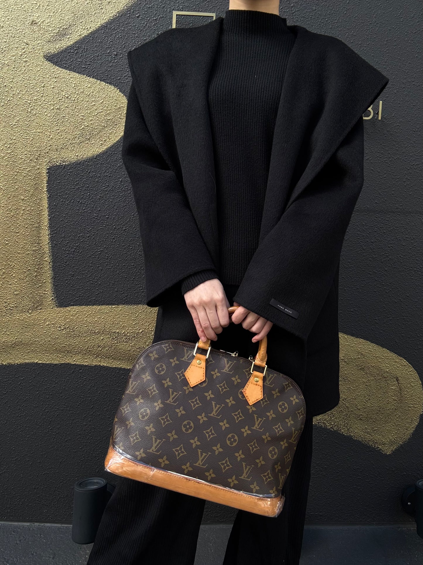 LOUIS VUITTON Alma Monogram Canvas Handbag Brow