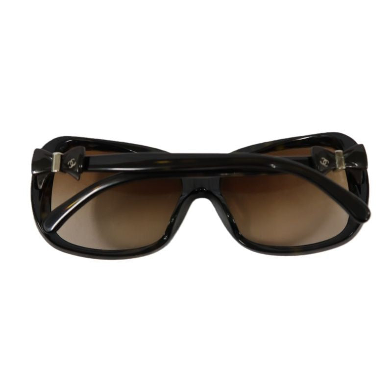 CHANEL Sunglasses, Brown. CHANEL Brown Resin Sunglasses.