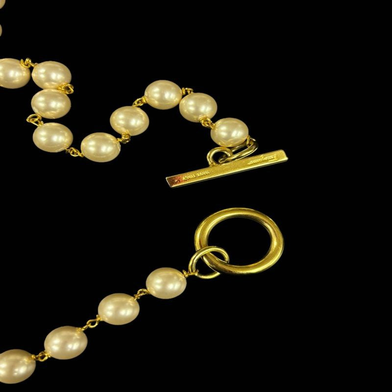 Salvatore Ferragamo Pearl Long Necklace, Gold-tone Hardware. Salvatore Ferragamo White Alloy Pearl Necklace.