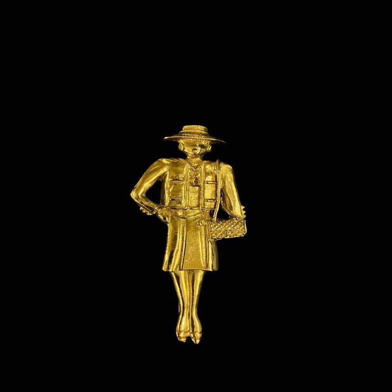 CHANEL Brooch, Coco Chanel Figure, Gold-tone Hardware. CHANEL Gold-tone Alloy Coco Chanel Brooch.