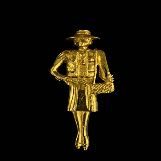 CHANEL Brooch, Coco Chanel Figure, Gold-tone Hardware. CHANEL Gold-tone Alloy Coco Chanel Brooch.