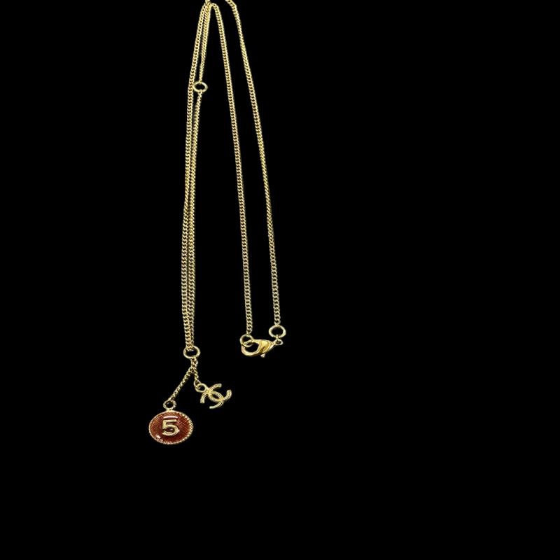 CHANEL Necklace, Gold-Tone Hardware, No.5, Red. CHANEL Gold-Tone Alloy Logo Necklace.