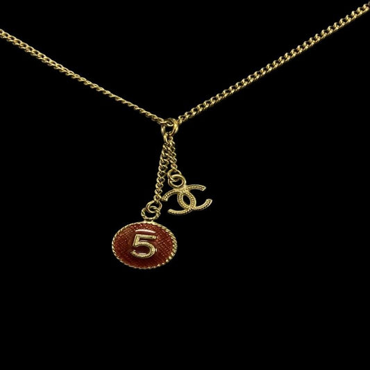 CHANEL Necklace, Gold-Tone Hardware, No.5, Red. CHANEL Gold-Tone Alloy Logo Necklace.