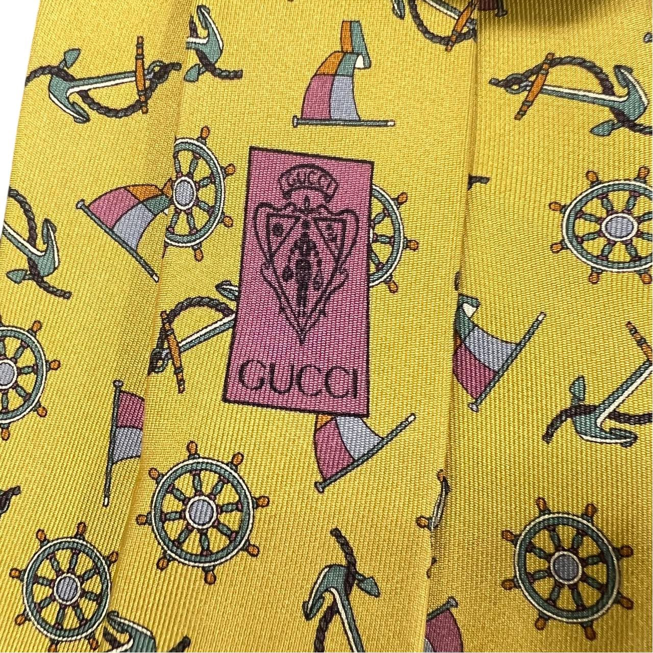GUCCI tie, yellow-toned, with tag
