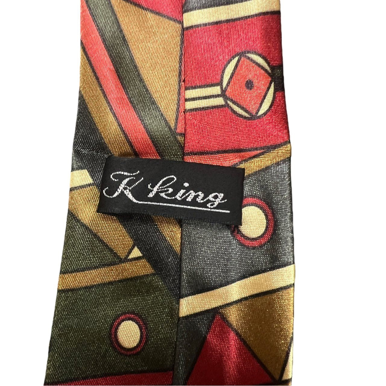 KING tie, red and brown-toned, with tag