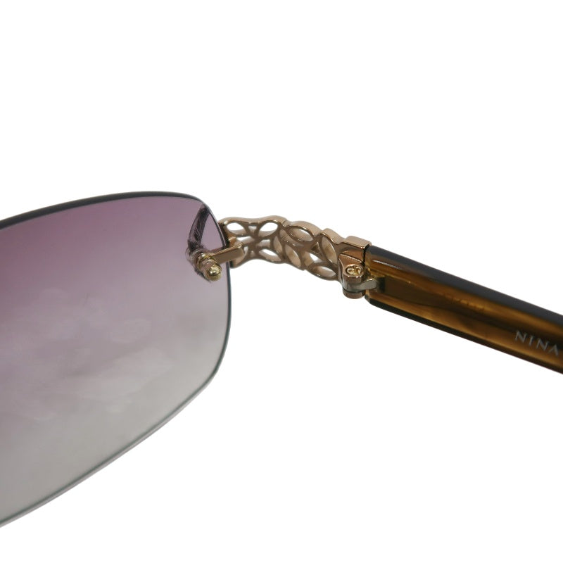 NINA RICCI Sunglasses Eyewear Gold Rimless Purple Gradient Lens Carved Decoration Elegant