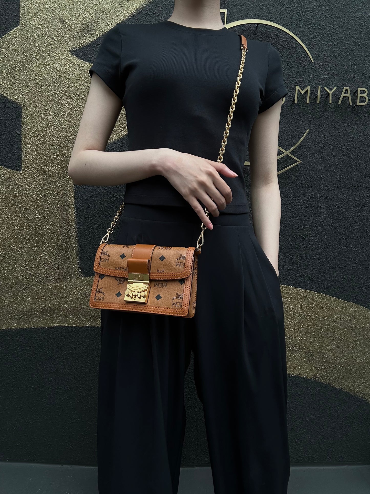MCM Mini Postman Shoulder Bag Brown Visetos PVC Gold Hardware