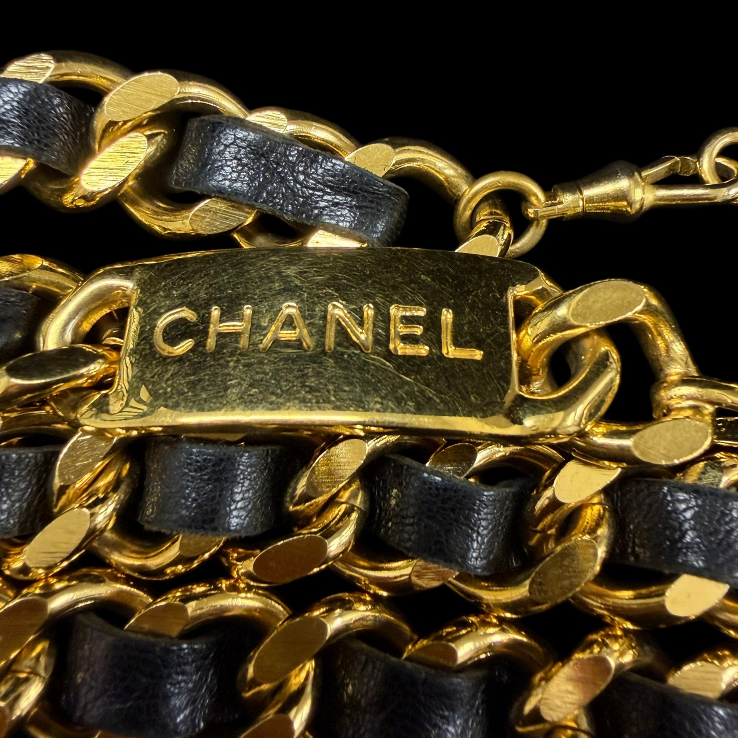 CHANEL Classic Lambskin Interwoven Chain Belt Black Leather Gold Hardware CC Logo Round Coin Pendant Vintage Iconic Elegant Outfit Accesory