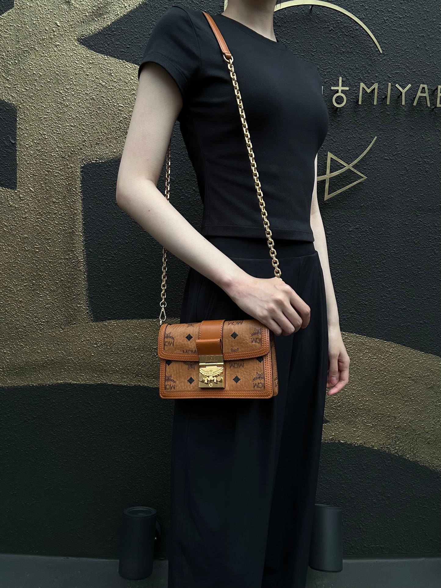 MCM Mini Postman Shoulder Bag Brown Visetos PVC Gold Hardware