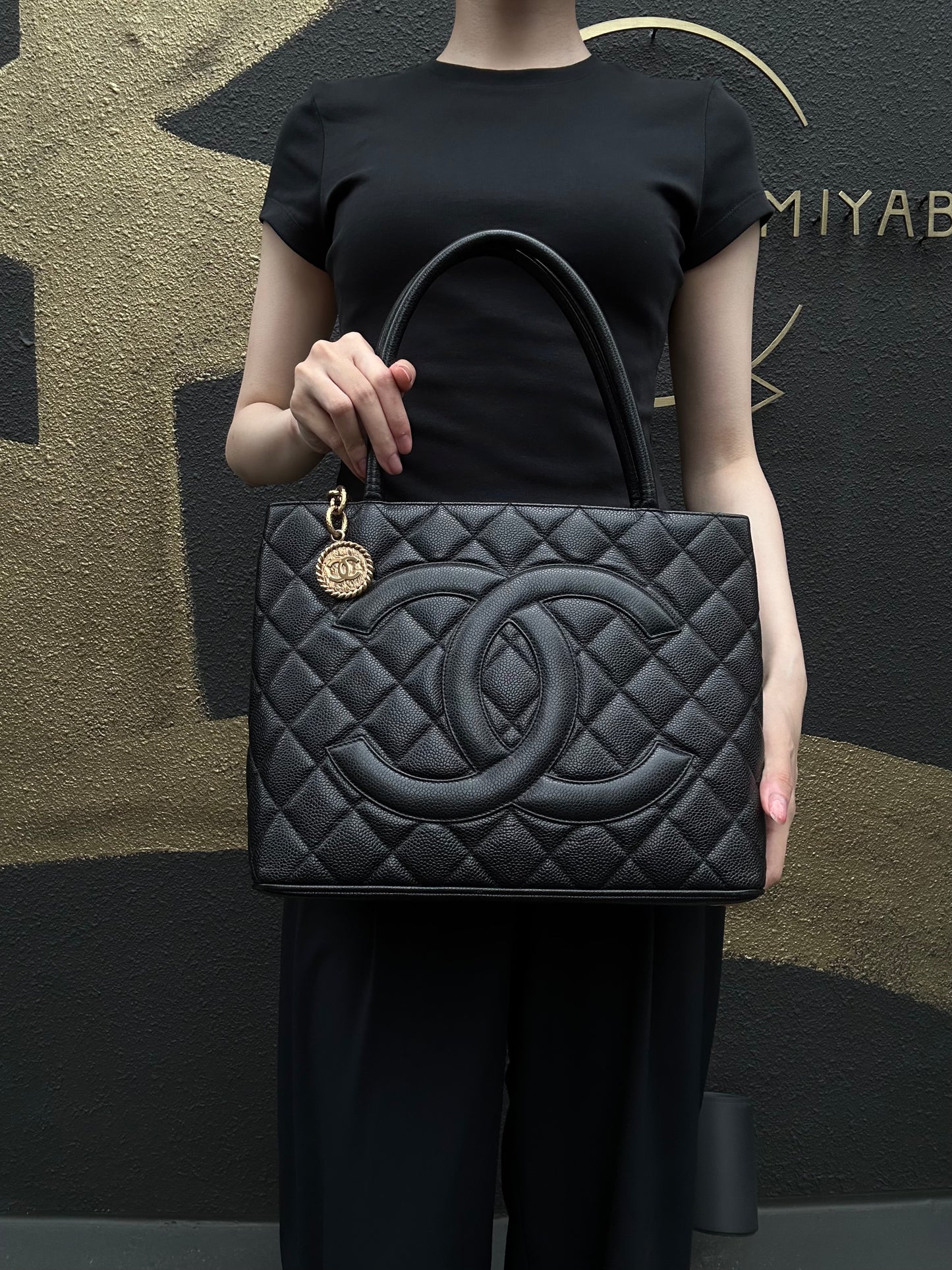 CHANEL Vintage Caviar Leather Hilton Tote Bag Black Gold Hardware With Gold Tag