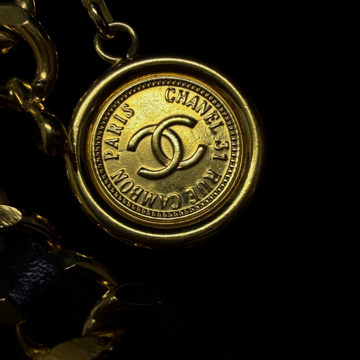 CHANEL Classic Lambskin Interwoven Chain Belt Black Leather Gold Hardware CC Logo Round Coin Pendant Vintage Iconic Elegant Outfit Accesory