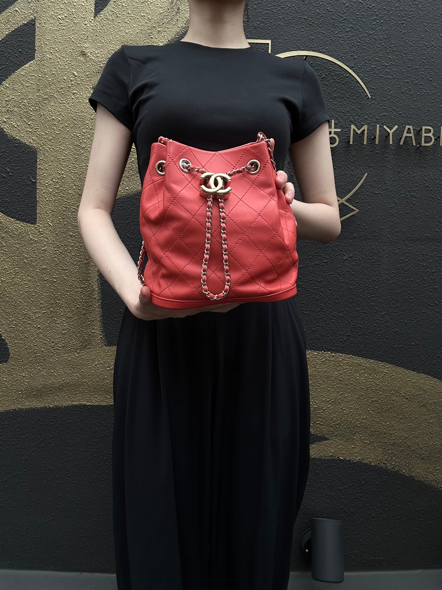 CHANEL Matelasse Caviar Leather Drawstring Bucket Shoulder Bag Orange Gold-Tone Hardware
